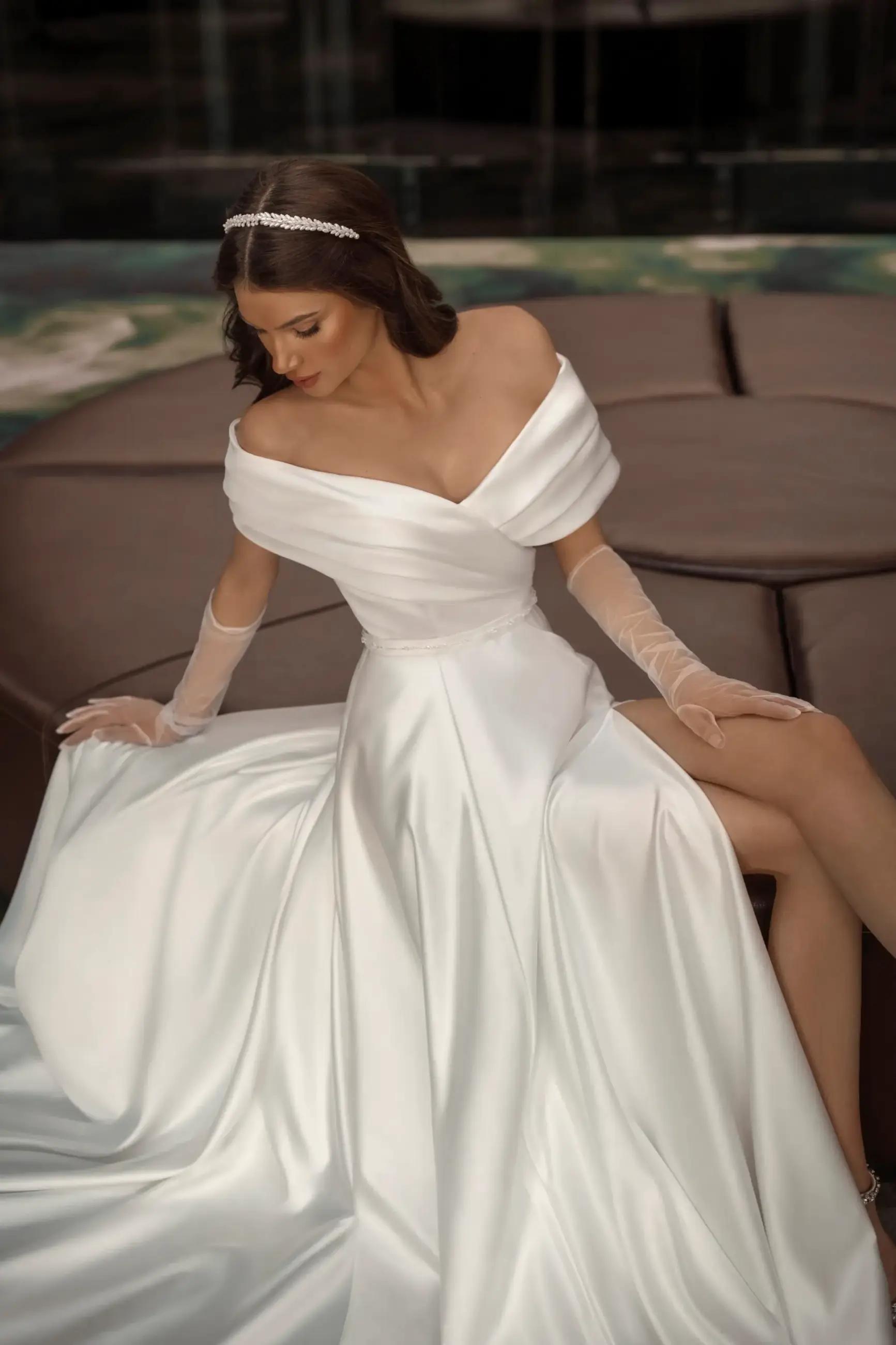 Minimalist Elegance: Top Simple Wedding Dresses for 2024 Brides Image